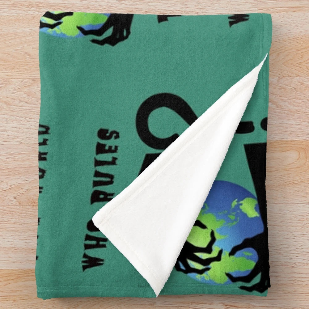 Plush blanket with conspiracy theory inspired designs