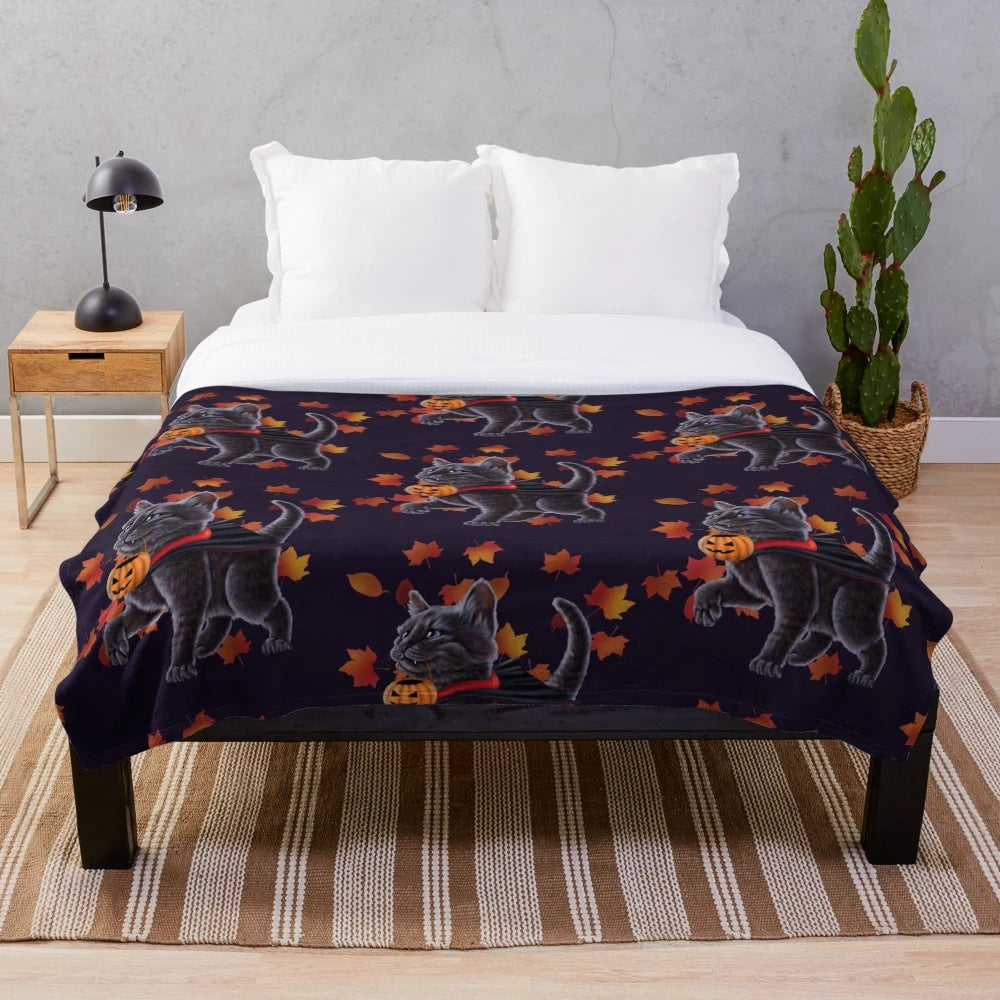 Cozy plush blanket featuring a cute Halloween-themed kitten in a vampire costume