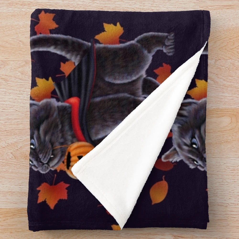 Cozy plush blanket featuring a cute Halloween-themed kitten in a vampire costume