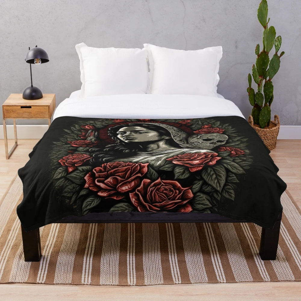 Dark-skinned Virgin of Guadalupe design on a plush blanket