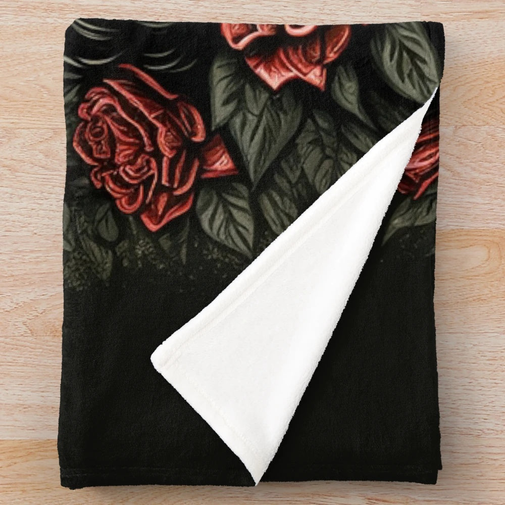 Dark-skinned Virgin of Guadalupe design on a plush blanket