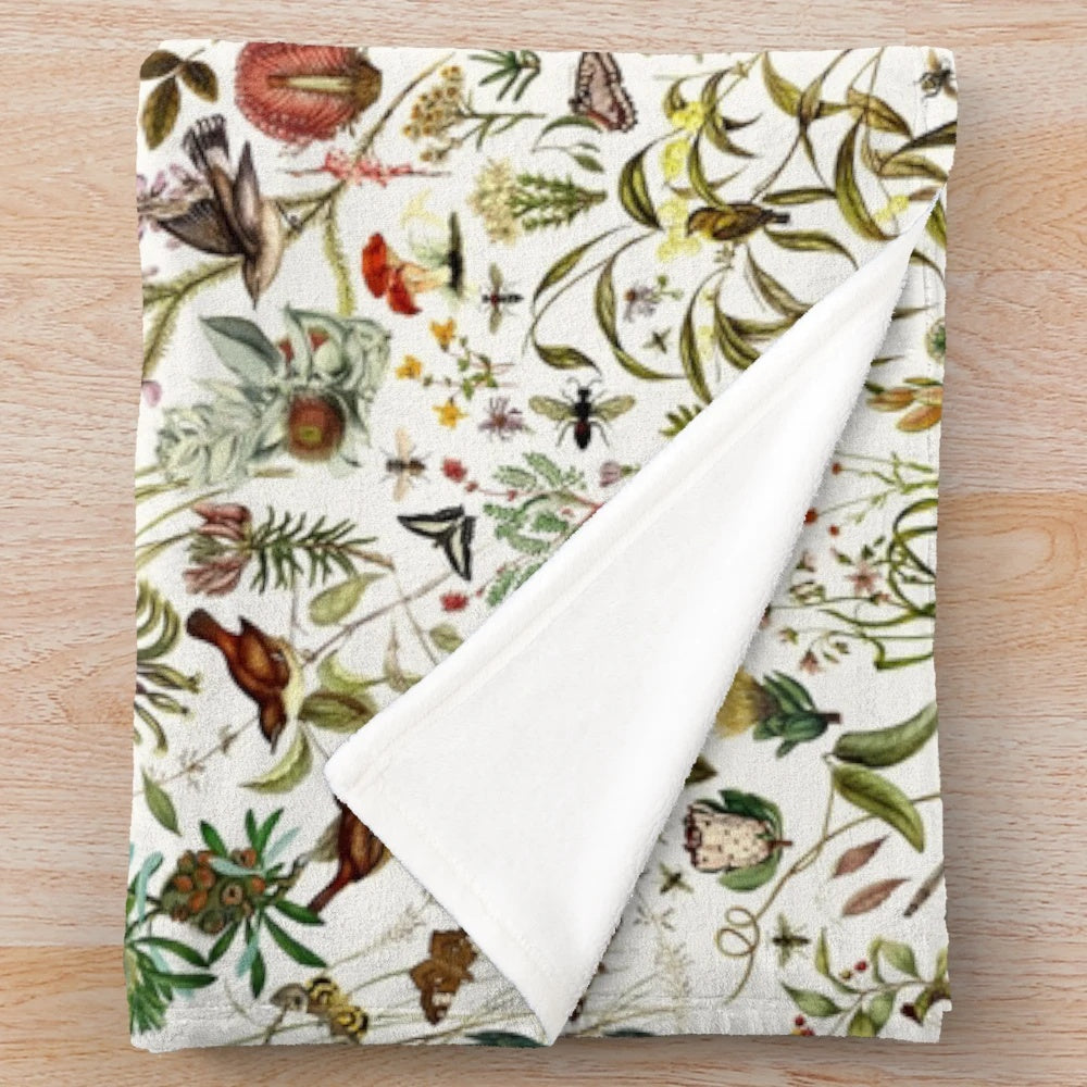 Plush blanket featuring a detailed collage of Australian flora and fauna