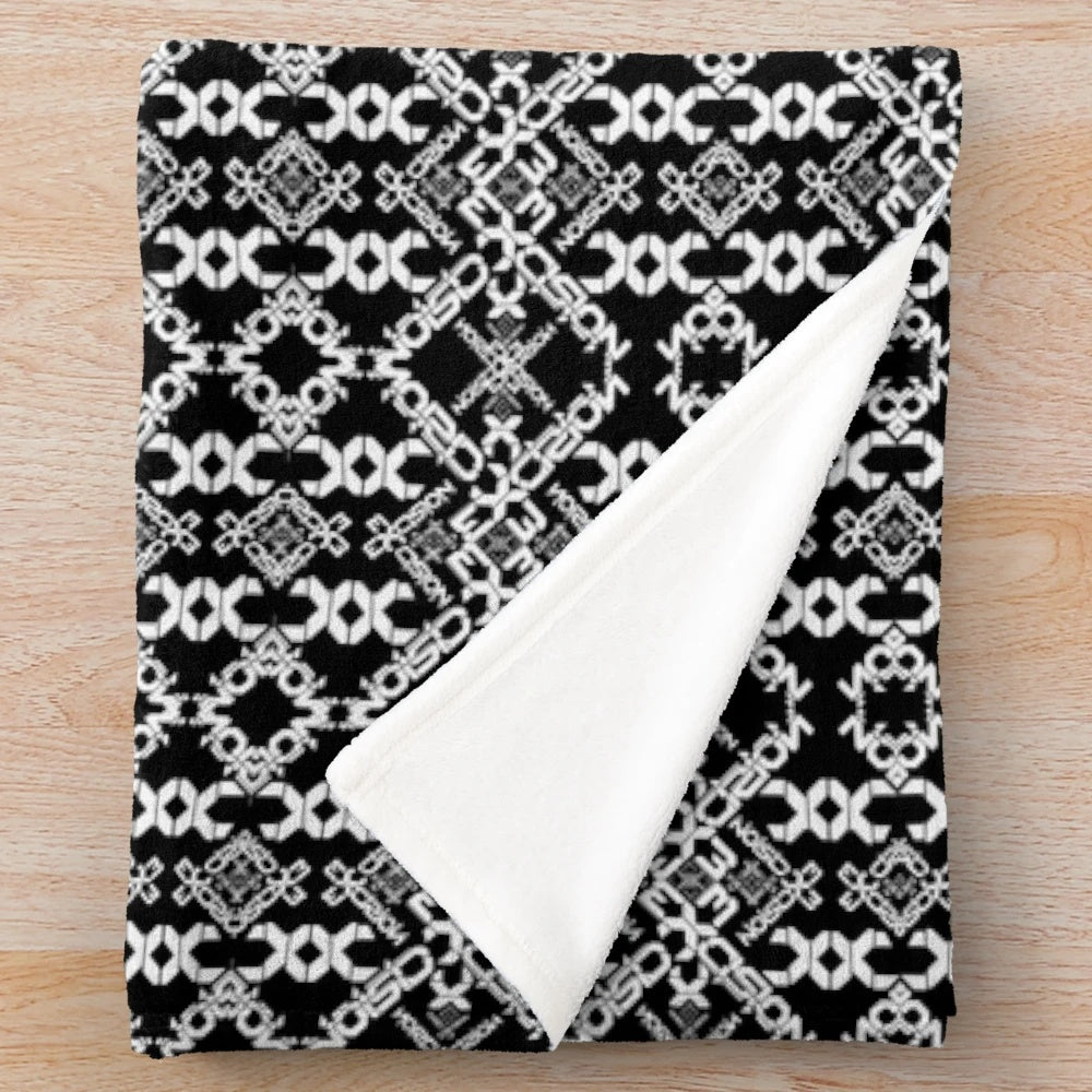 Plush blanket with vibrant electronic music festival-inspired pattern