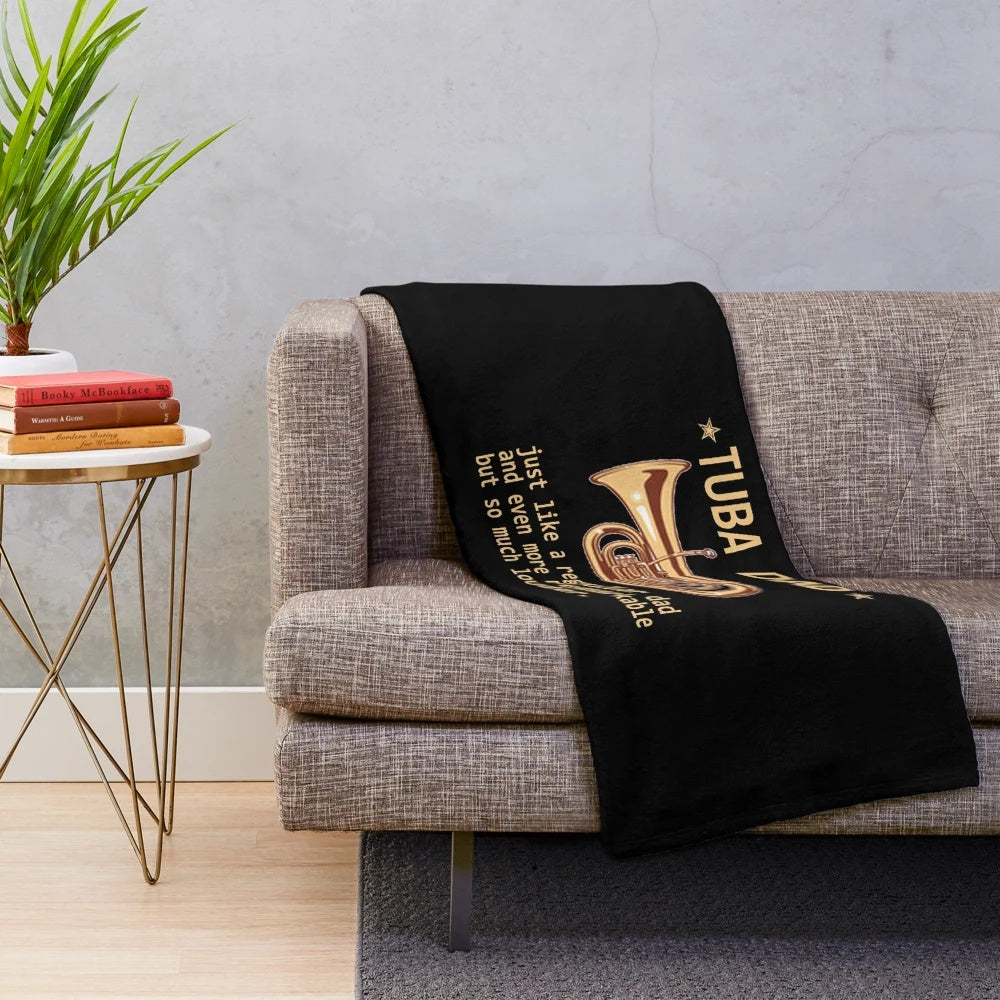 Plush blanket featuring a funny tuba player design
