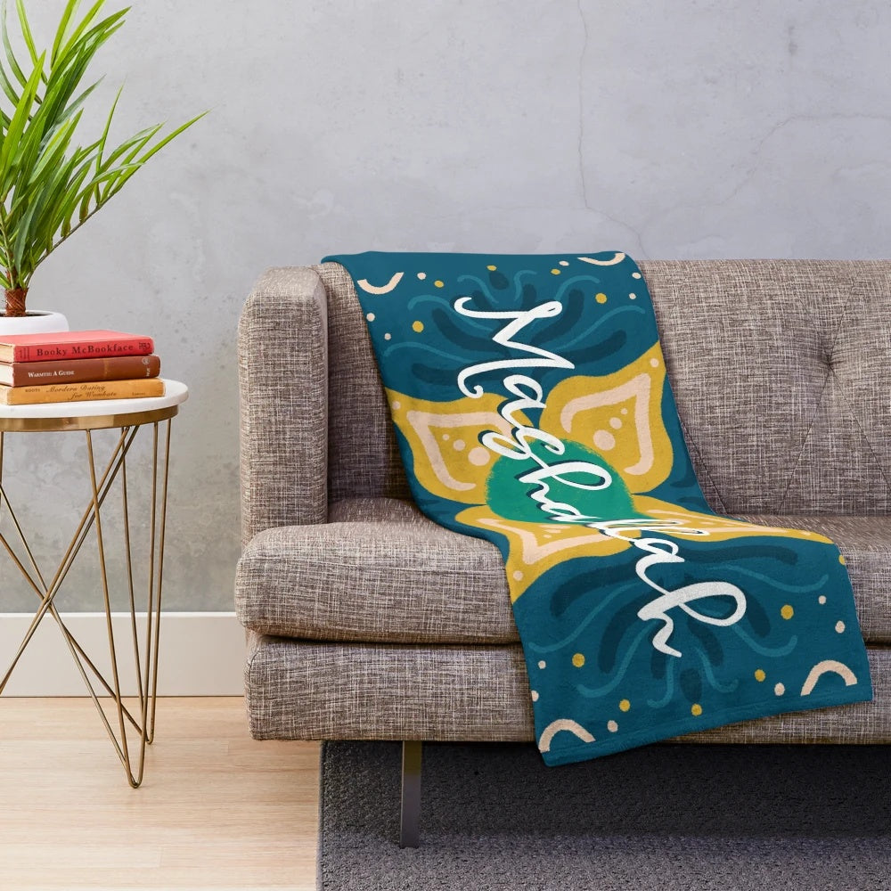 Plush blanket with 'God Willed It' Arabic calligraphy design