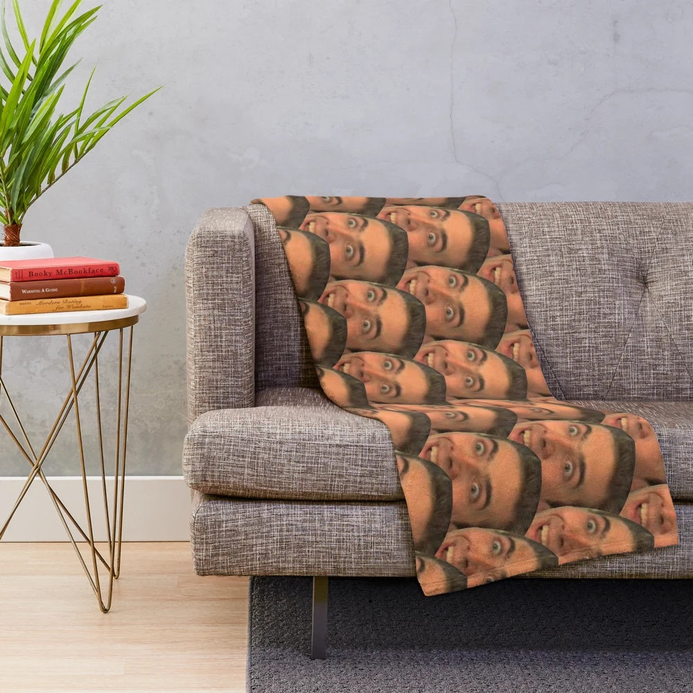 Plush blanket featuring a collage of funny and creepy Nicholas Cage memes