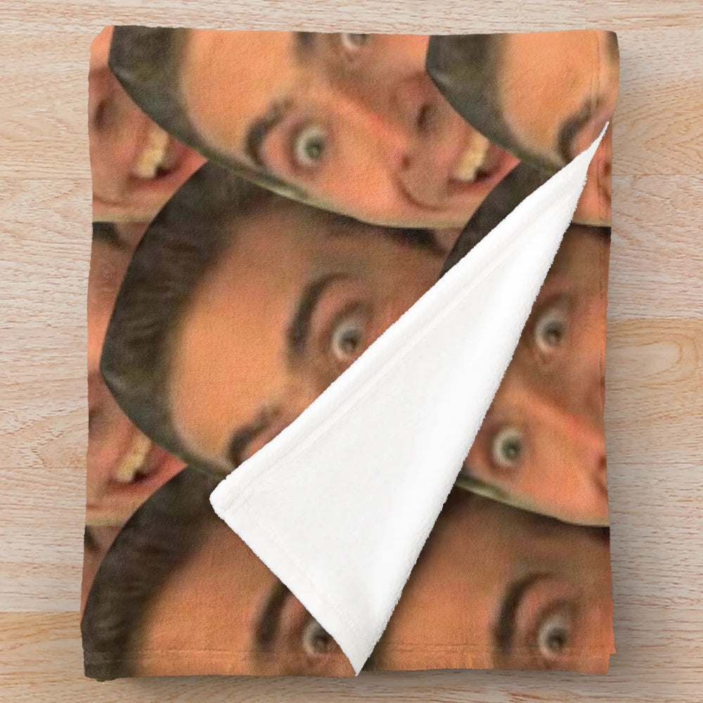 Plush blanket featuring a collage of funny and creepy Nicholas Cage memes