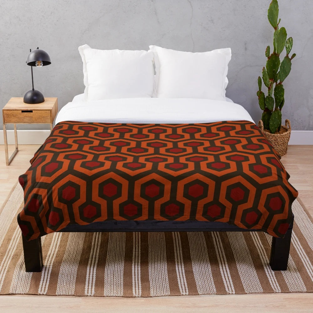 Plush blanket featuring the classic carpet pattern from The Shining