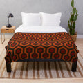 Plush blanket featuring the classic carpet pattern from The Shining