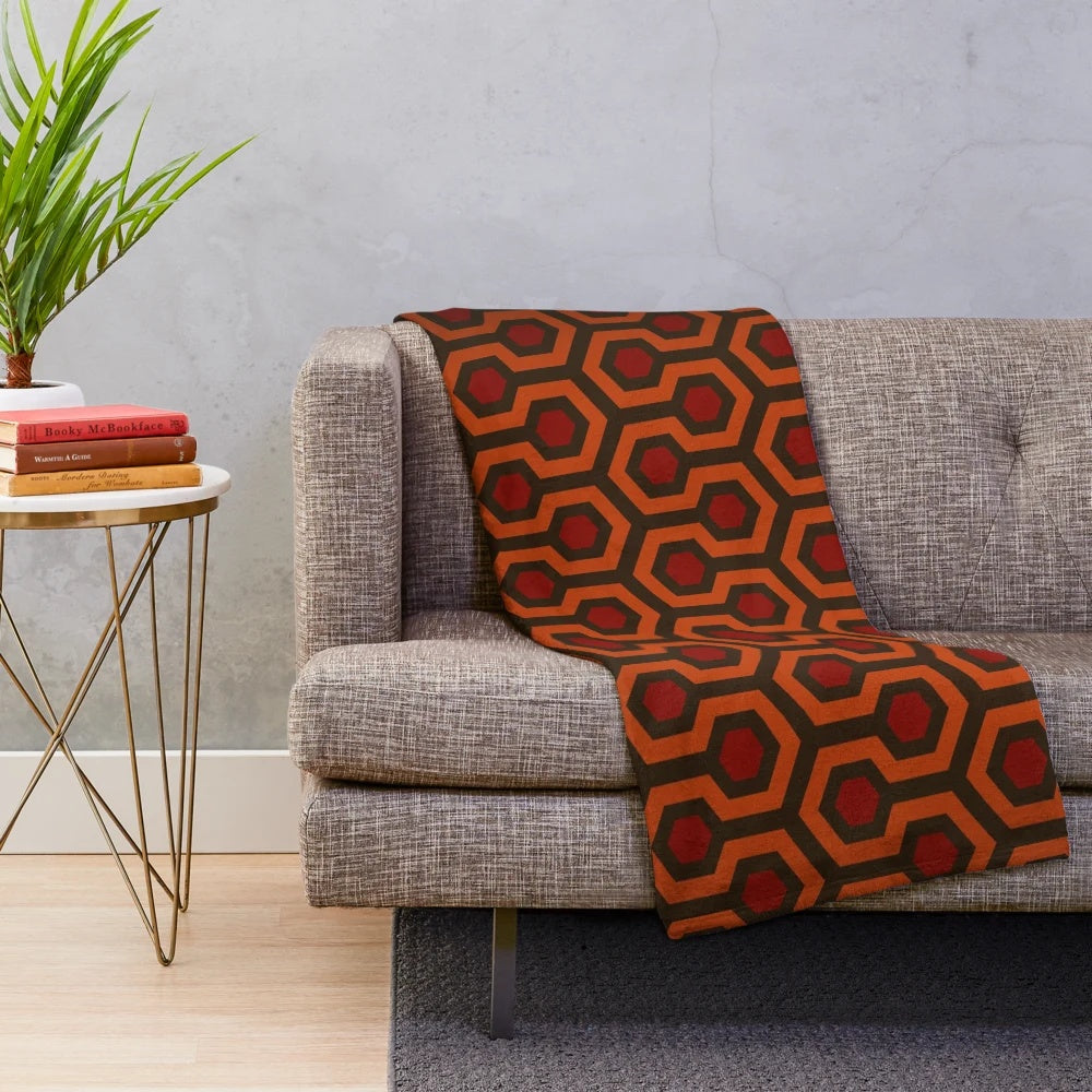 Plush blanket featuring the classic carpet pattern from The Shining