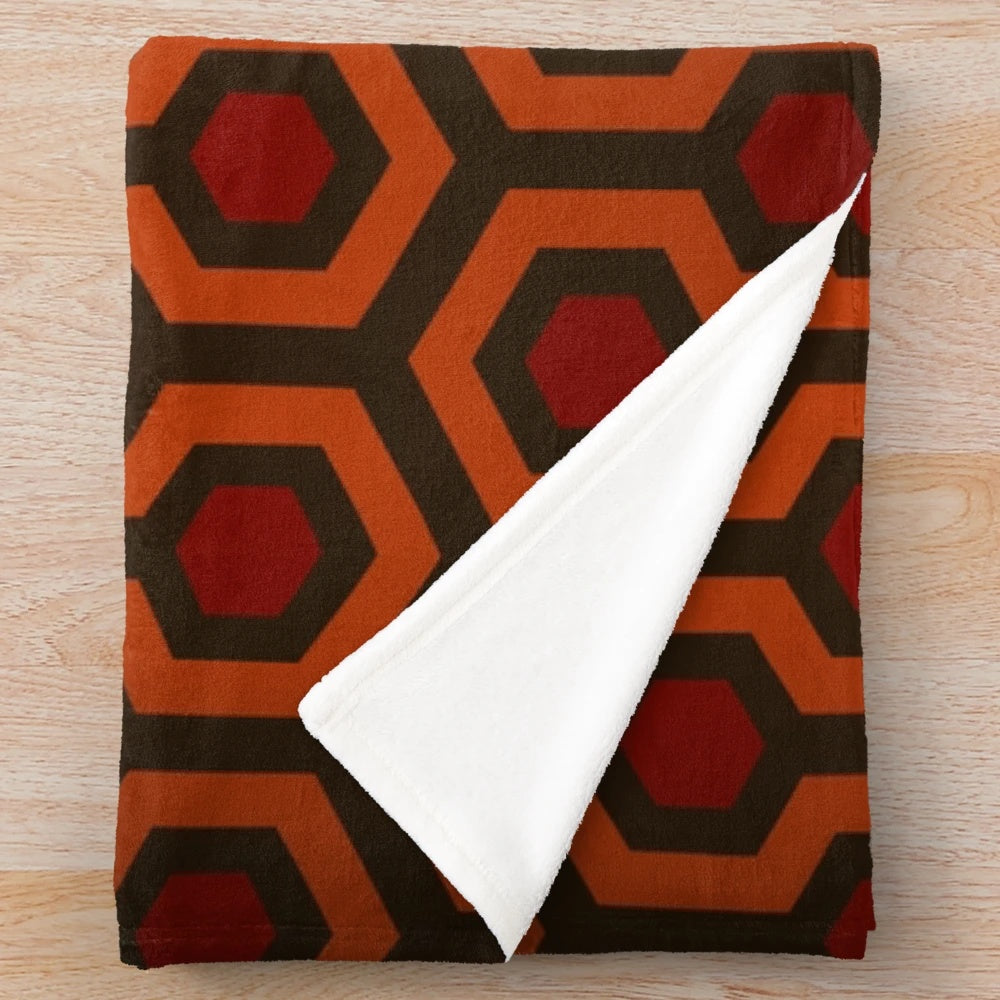 Plush blanket featuring the classic carpet pattern from The Shining
