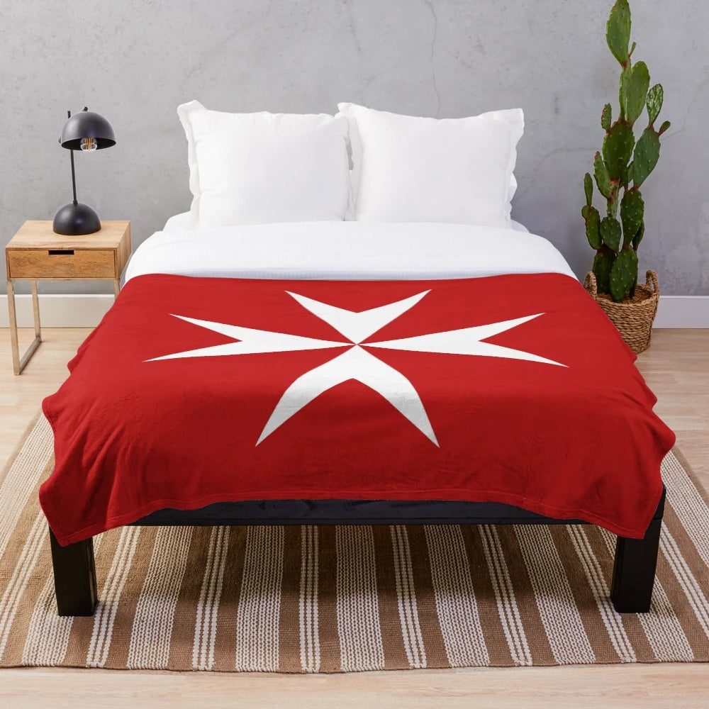 Plush blanket featuring the Maltese Cross, a historic heraldic symbol from Malta