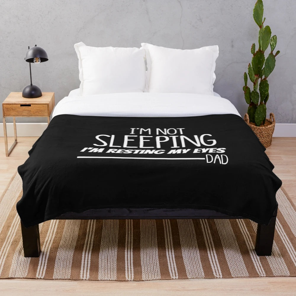 Plush blanket with "I'm Not Sleeping, I'm Resting My Eyes" design