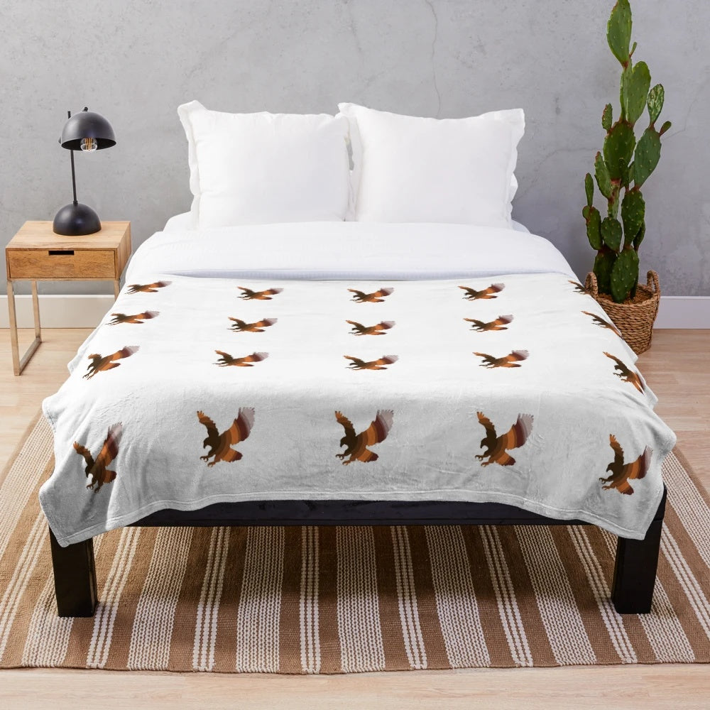 Plush blanket featuring a colorful, abstract design of a legendary hawk
