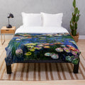 Plush blanket featuring Claude Monet's famous Water Lilies painting