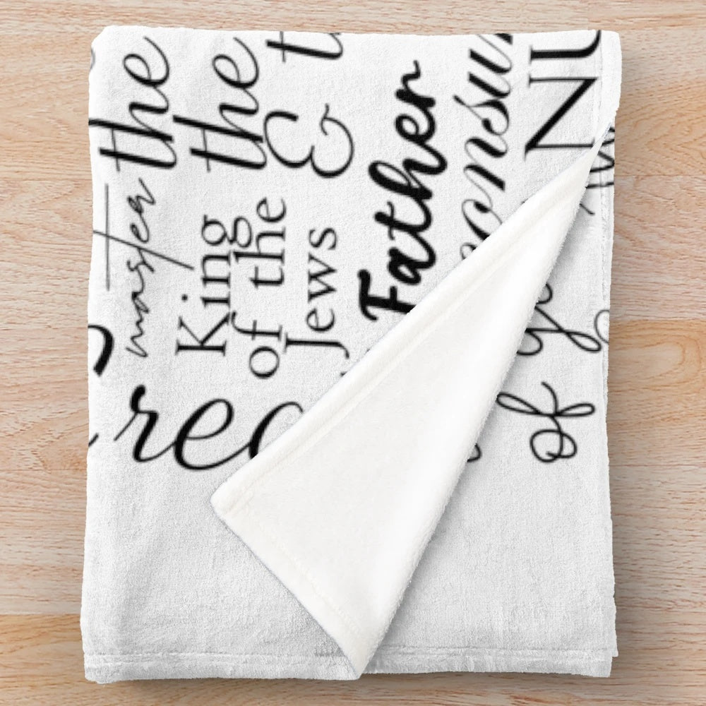 Plush blanket featuring the names of God in Christian inspired calligraphy and typography
