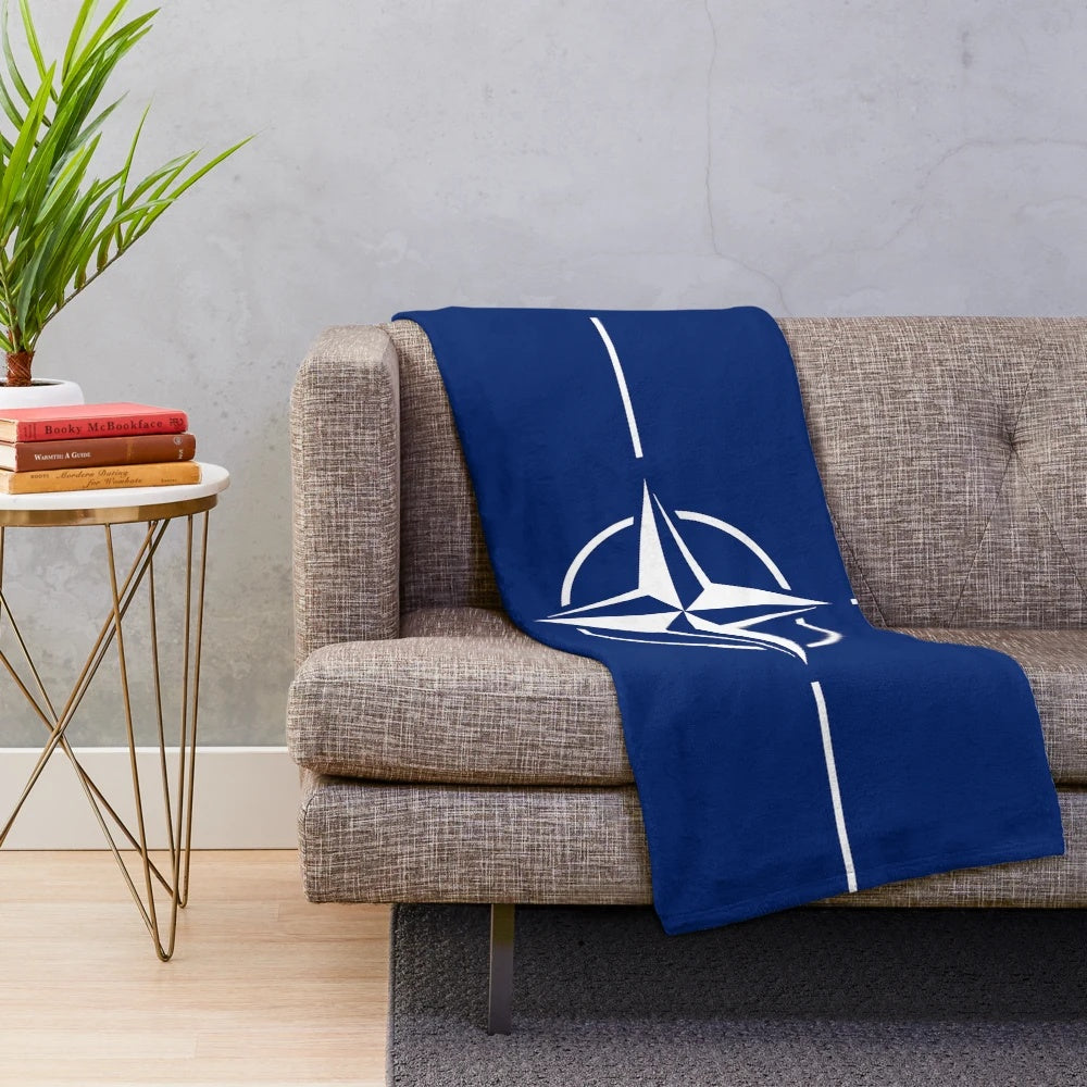 Cozy plush blanket featuring the NATO flag design