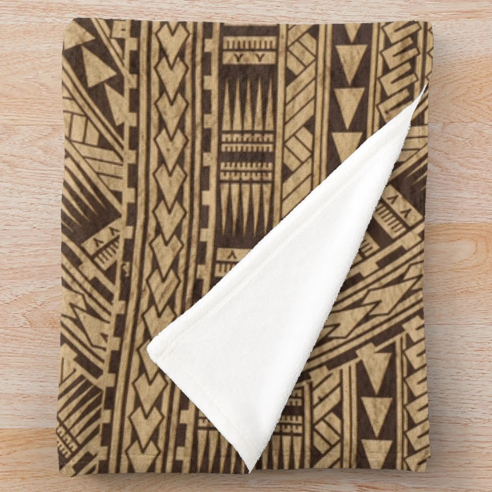 Soft cozy plush blanket featuring a Samoan tapa cloth inspired pattern