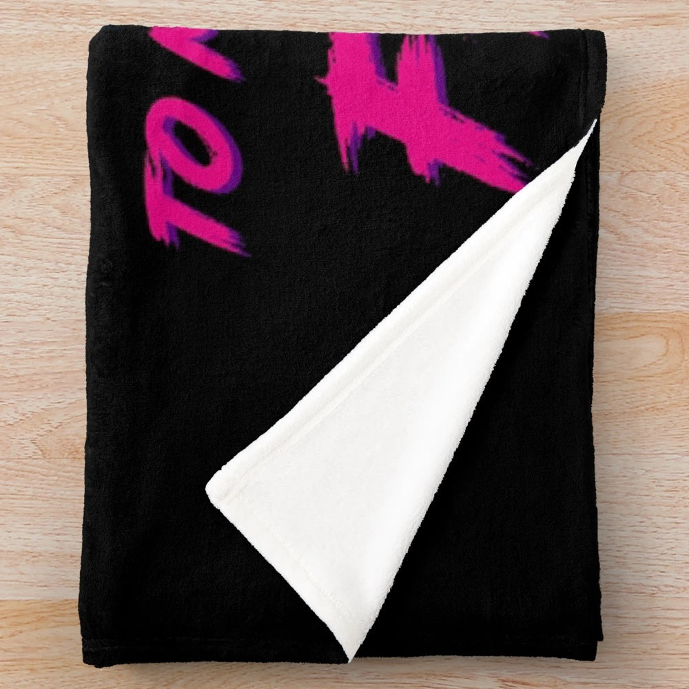 Cozy plush blanket with neon retro movie-inspired design