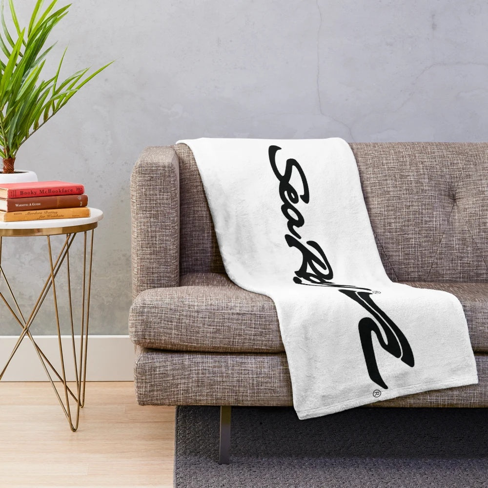 Plush blanket with SeaRay Boats logo