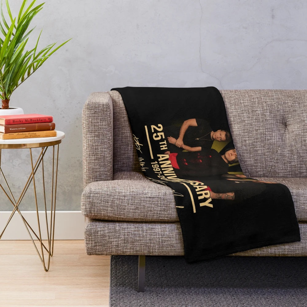 Plush blanket with Canadian band signatures and concert imagery