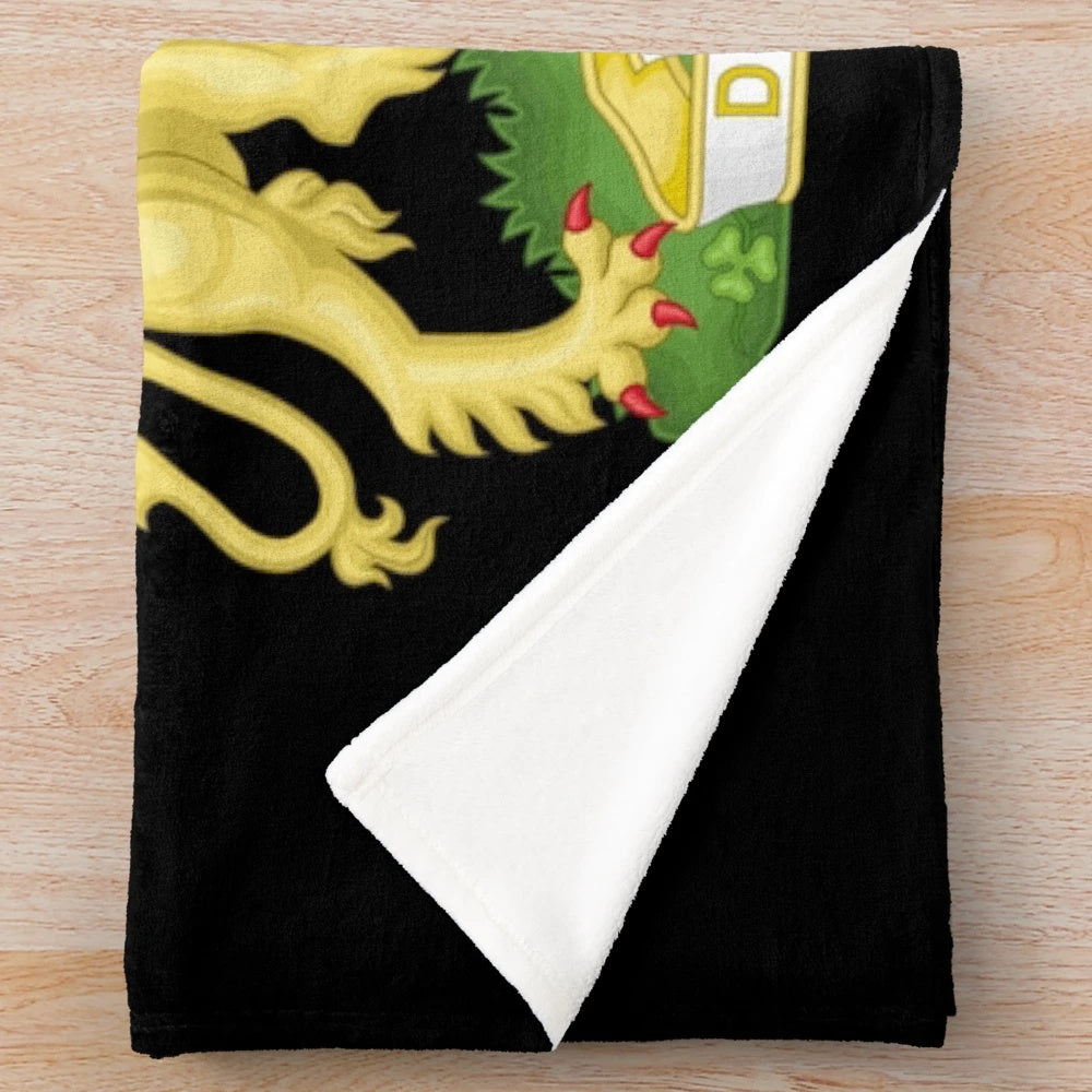 Plush blanket featuring the iconic UK royal coat of arms