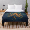 Plush blanket featuring an abstract watercolor painting of underwater ocean life