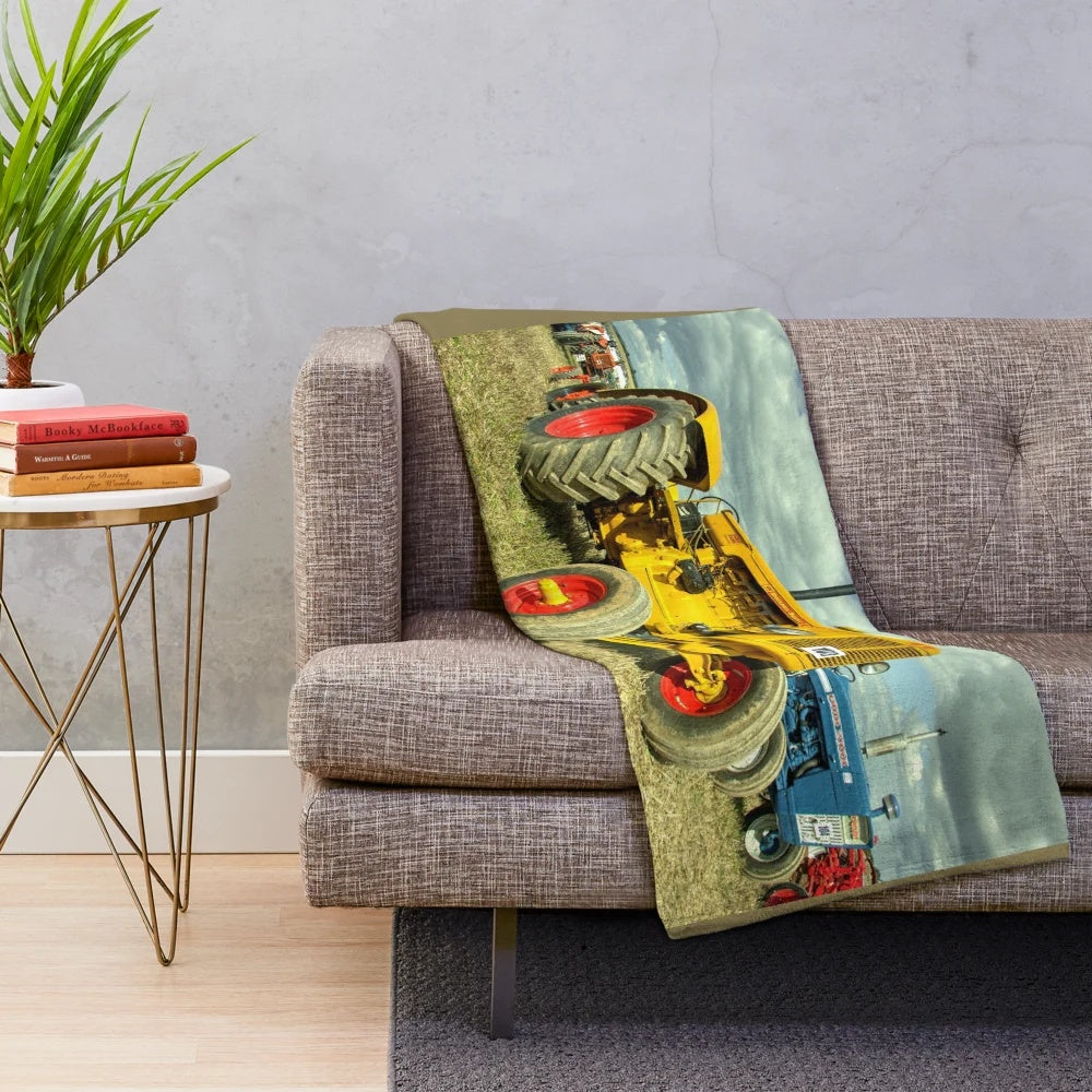 Plush blanket with vintage Minneapolis Moline G tractor design