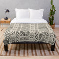 Soft and cozy plush blanket with African inspired tribal print design