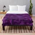 Soft, plush purple blanket with camouflage pattern design