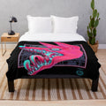 Plush canine-themed blanket with pastel animal print and creepy eyes