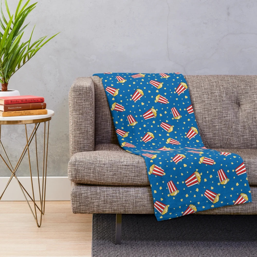 Cozy plush blanket with a cinema-inspired popcorn pattern vector illustration