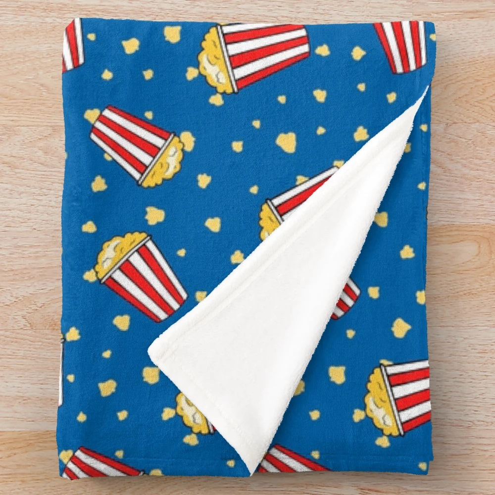 Cozy plush blanket with a cinema-inspired popcorn pattern vector illustration