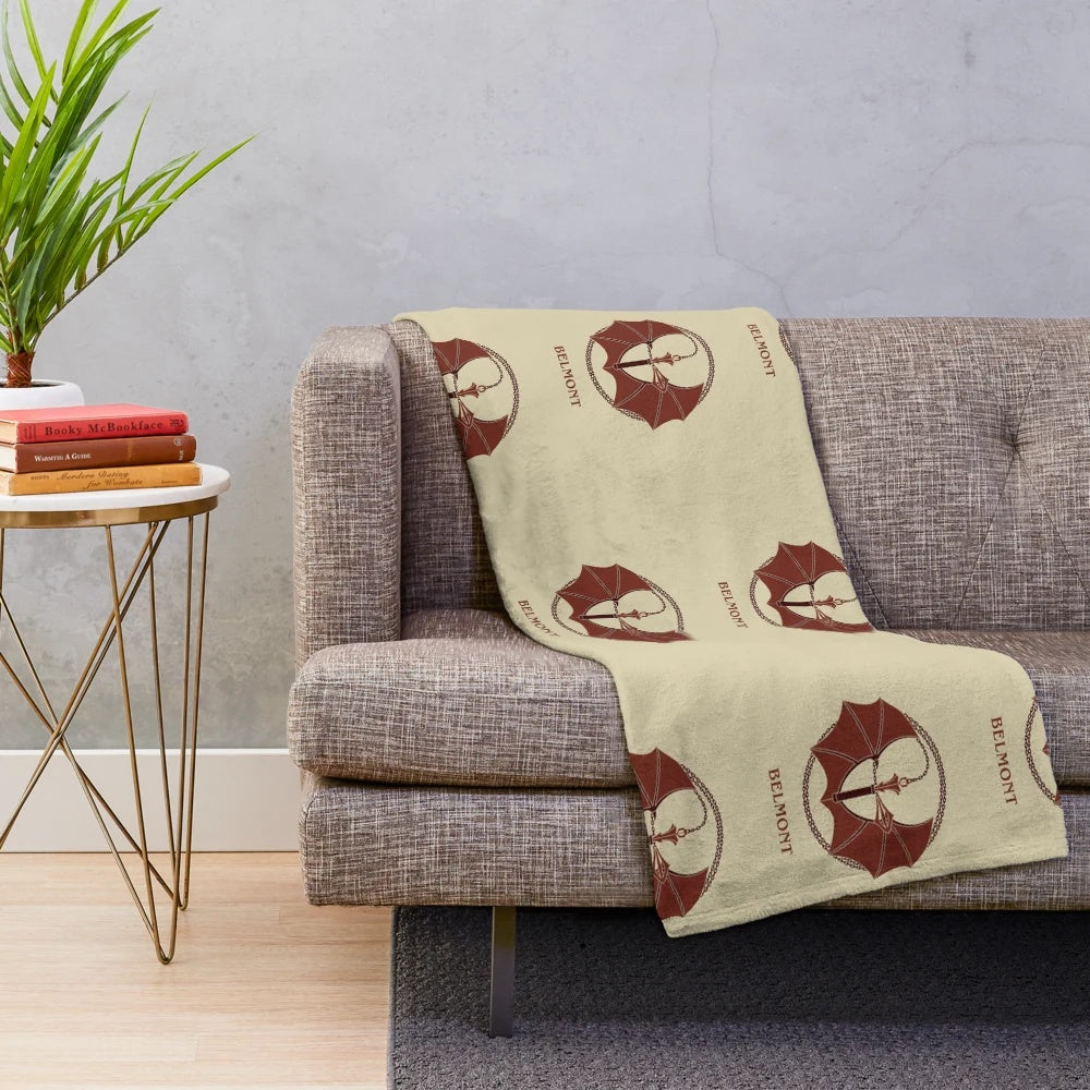 Plush blanket with a crest design inspired by the video game Castlevania