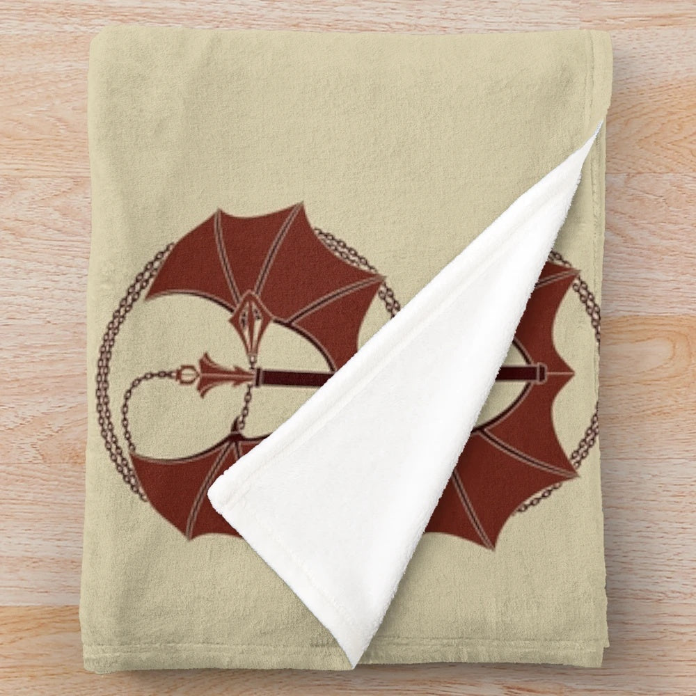 Plush blanket with a crest design inspired by the video game Castlevania