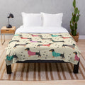 Dachshund plush blanket with seamless pattern of cute wiener dogs