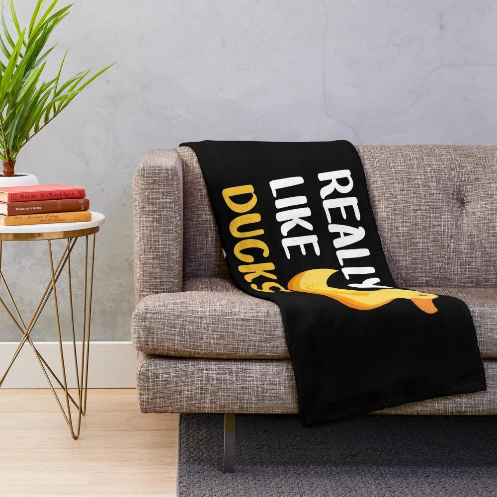Soft and cozy plush duck blanket with a cute duck pattern
