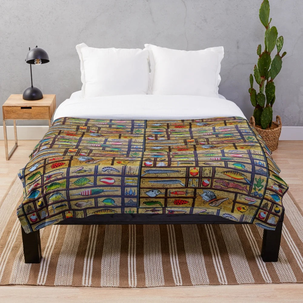 Plush blanket featuring a collection of realistic fishing lures