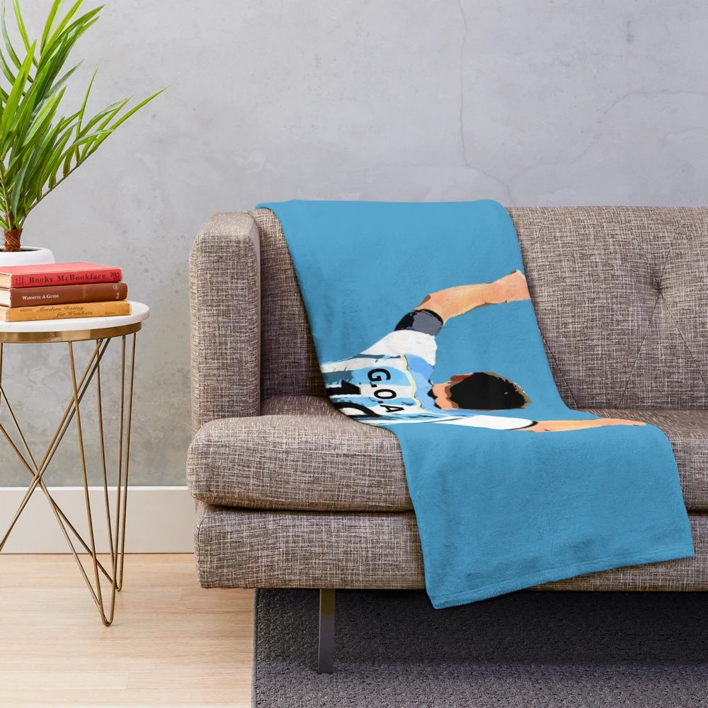 Plush football blanket with GOAT (greatest of all time) design