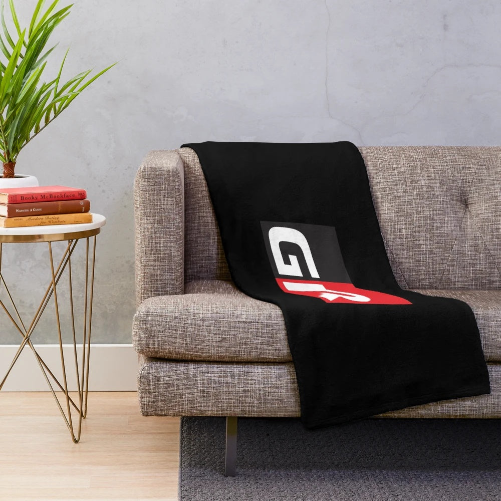 Gazoo Racing inspired plush blanket with GR logo and Toyota GR models