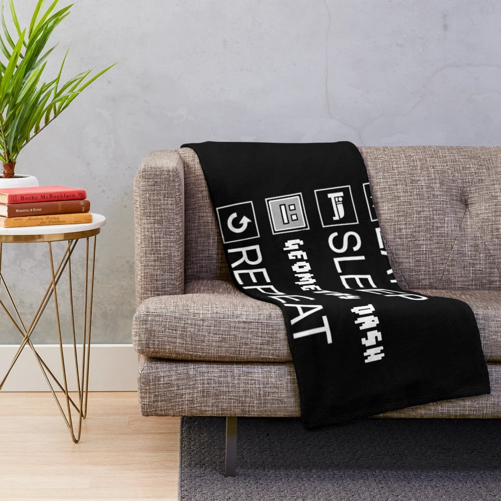 Geometry Dash inspired plush blanket with "Eat Sleep Repeat" design