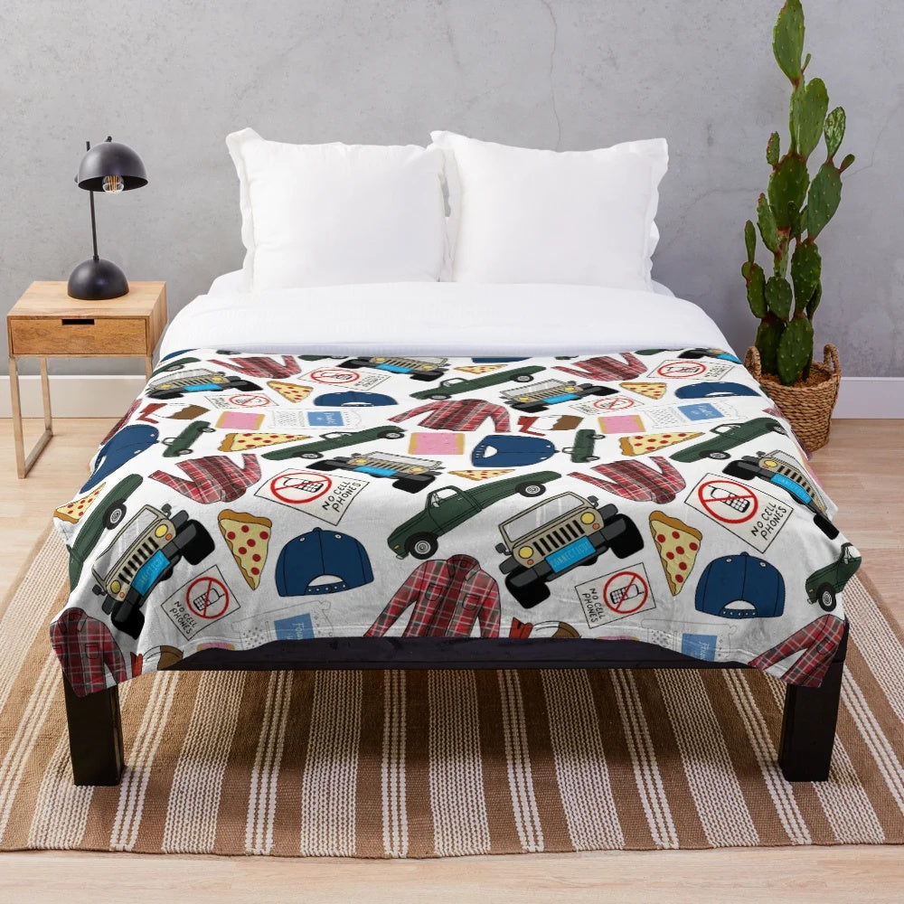 Plush white blanket with Gilmore Girls themed patterns and icons