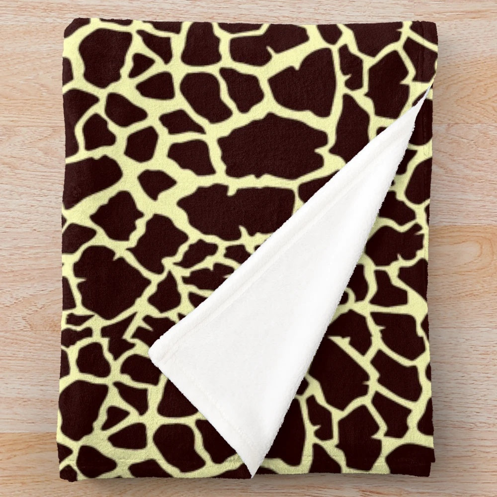 Plush giraffe inspired blanket with soft animal print design
