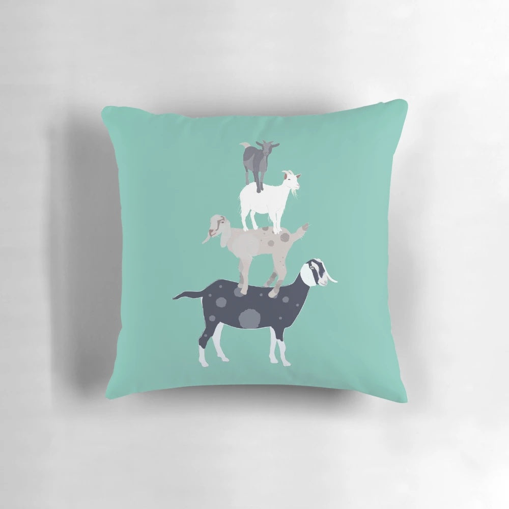 Soft and cozy plush pillow featuring a stack of adorable goats