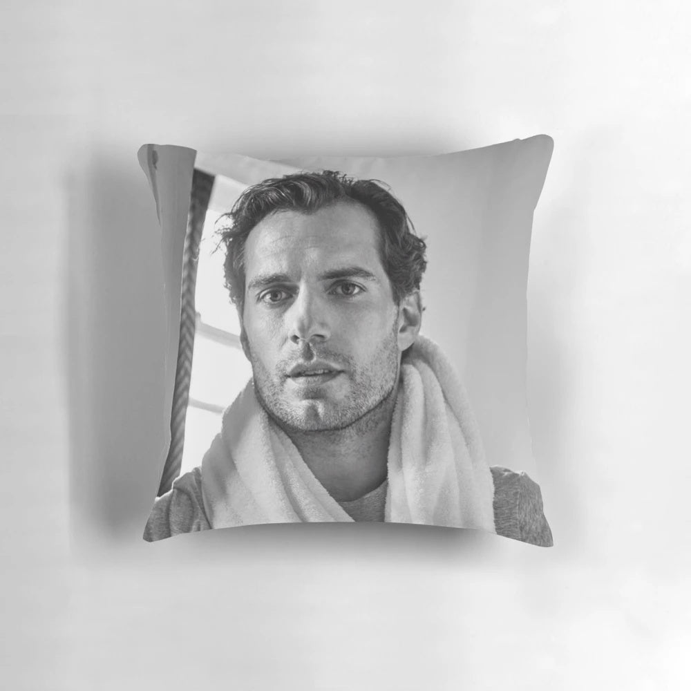 A soft, cuddly pillow featuring the image of Henry Cavill, the renowned actor.