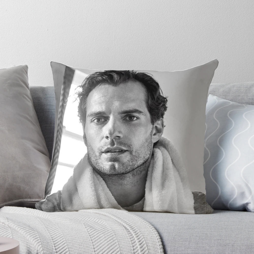A soft, cuddly pillow featuring the image of Henry Cavill, the renowned actor.