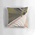 Closeup of a plush "Inside the Piano" pillow, showcasing the intricate details of piano strings and mechanics.
