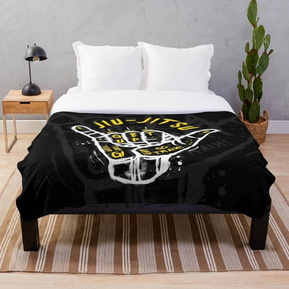 Plush jiu jitsu blanket with Brazilian jiu jitsu, MMA, and martial arts design