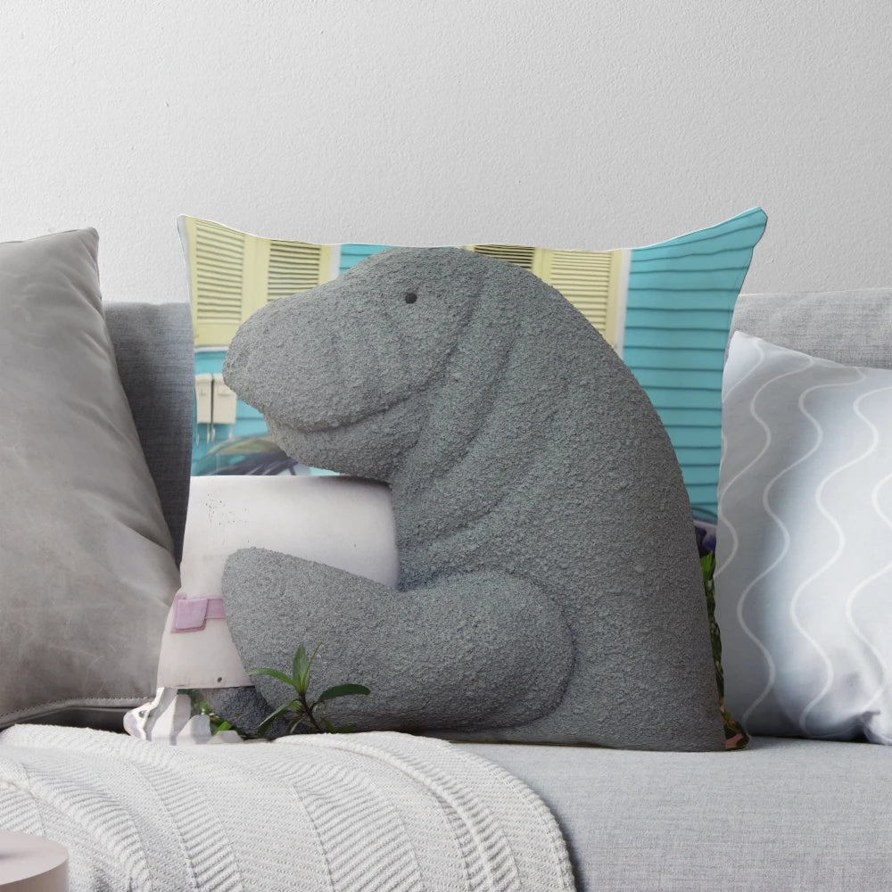 Soft, plush manatee-shaped pillow with a mailbox design, perfect for home decor.