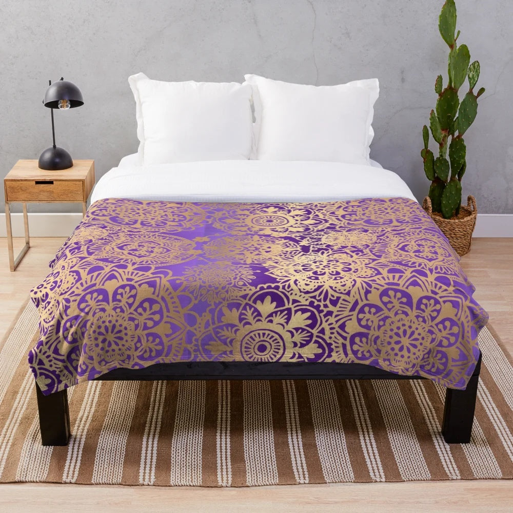 Plush purple and gold mandala pattern blanket